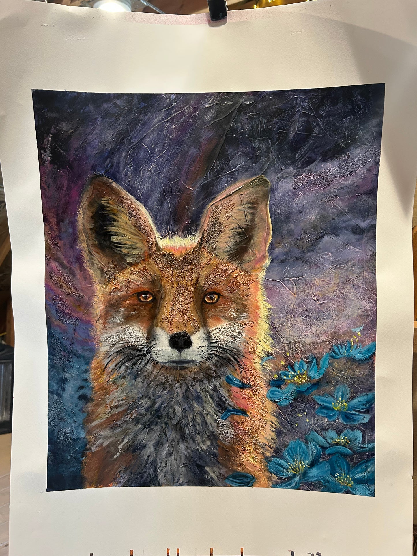 Colorful painting of a fox with floral elements on a dark space like background